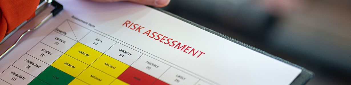 NEBOSH professional conducting a practical risk assessment